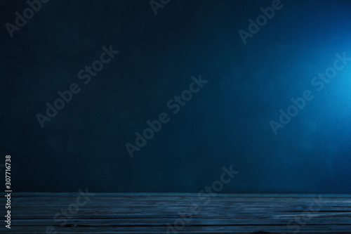 Dark blue background with old wooden table. Color of the year 2020 Classic Blue pantone