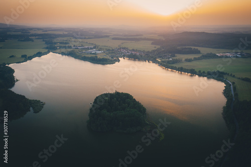 Pond in south Bohemia in Czech Repablic in Novohradske hory with island. photo