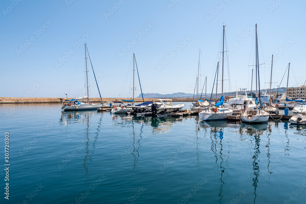 Fishing boats near the pier in the port of Chania