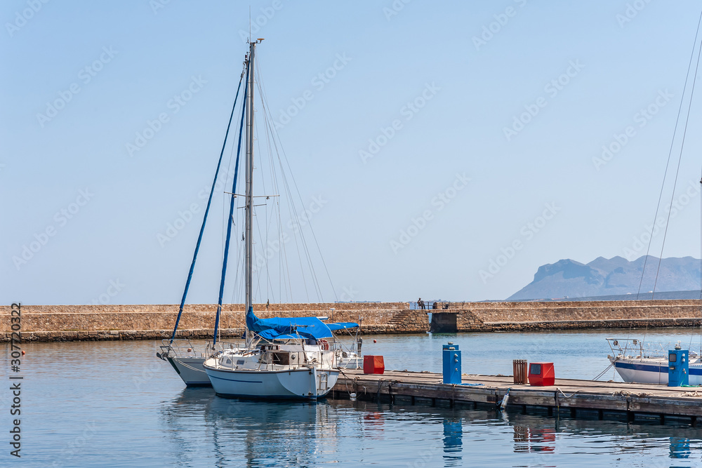 Fishing boats near the pier in the port of Chania.