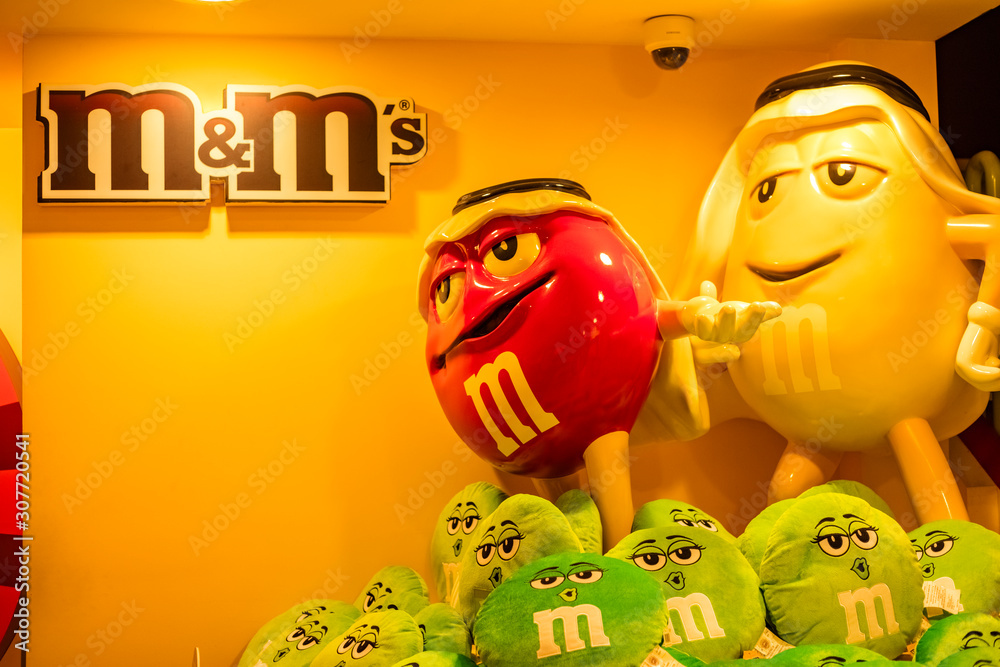 Photo of M&Ms. Character mascot of chocolate brand m&ms on candies