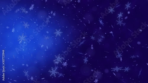 Beautiful loopable abstract winter snow background with falling snowflakes and floating blurry glitter particles lights. 4K seamless loop video footage of the snowfall.