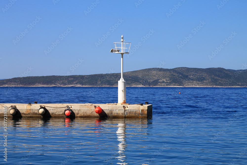 White lighthouse near Adriatic sea