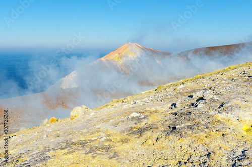 sulphur fumaroles on the top of the volcano crater in vulcano, aeolian islandsn, Italy photo