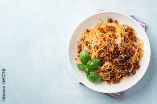 Konstfotografi Spaghetti pasta bolognese in plate on concrete background