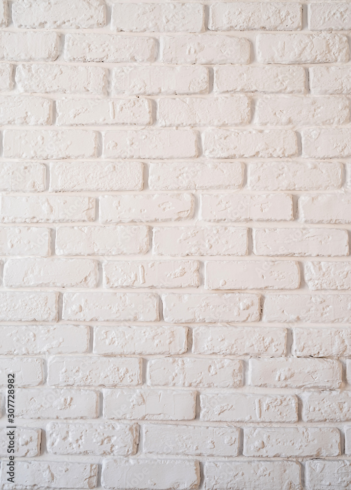 A white brick wall background vertical orientation