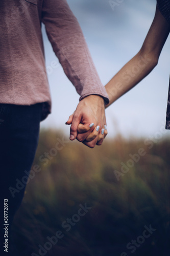 couple holding hands