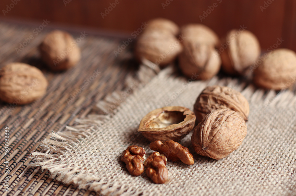 Walnuts isolated on the brown background Walnuts isolated on the brown background