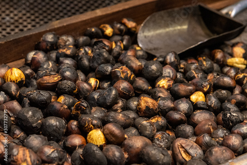 Roasted chestnuts, typical dessert of the festival of All Saints in Catalonia photo