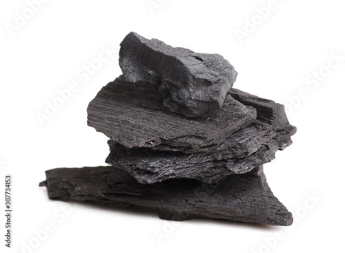 charcoal pile standing on top of each other isolated on a white background