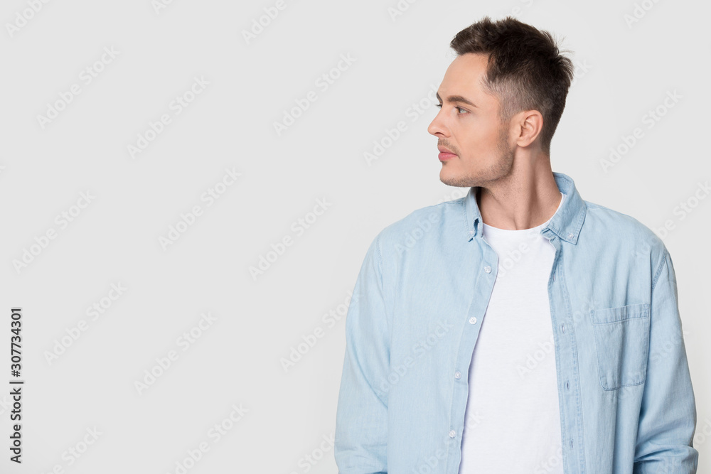 © fizkes - Side profile view of man looking at empty copy space © fizkes - Side profile view of man looking at empty copy space