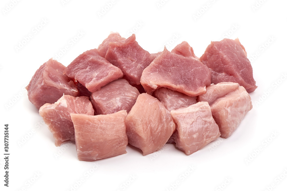 Raw pork pieces, isolated on white background