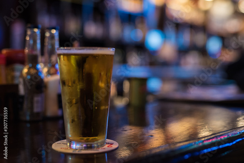 glass of beer on bar