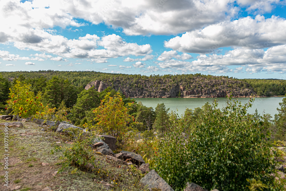 Obraz premium Summer Scandinavian landscape of the Aland Islands Midsummer day in the Åland Islands between Finland and Sweden