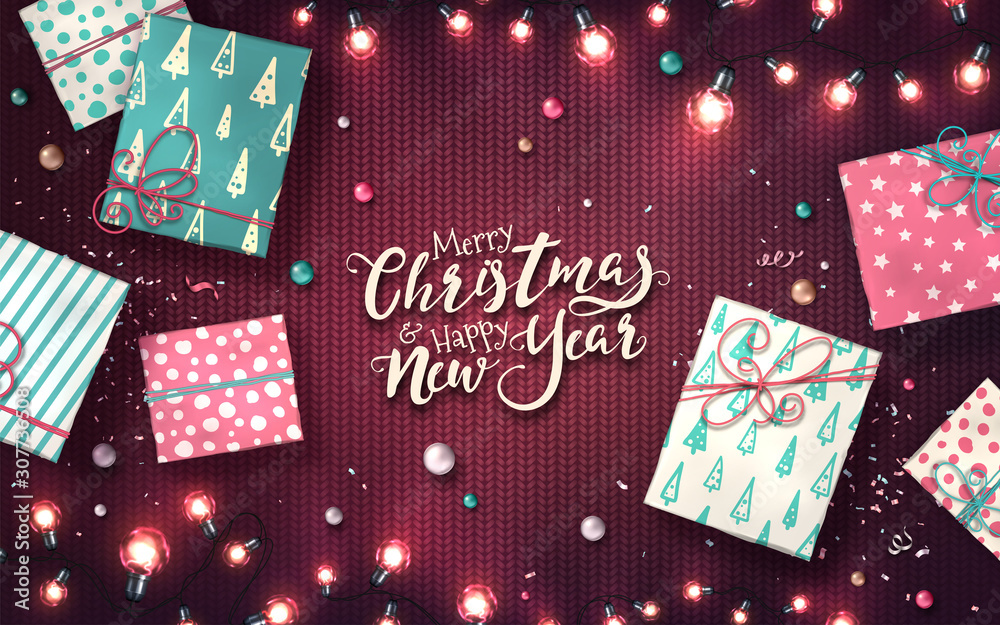 Fototapeta premium Christmas and new year banner with gift boxes, xmas garlands of lights, baubles and glitter confetti on purple knitted texture. Horizontal holiday background with glowing LED light bulbs. Vector