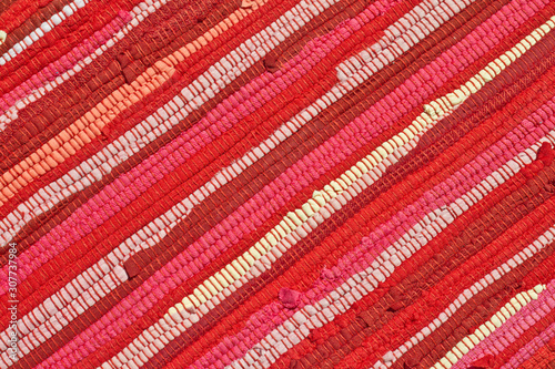 detail of red rug with diagonal lines