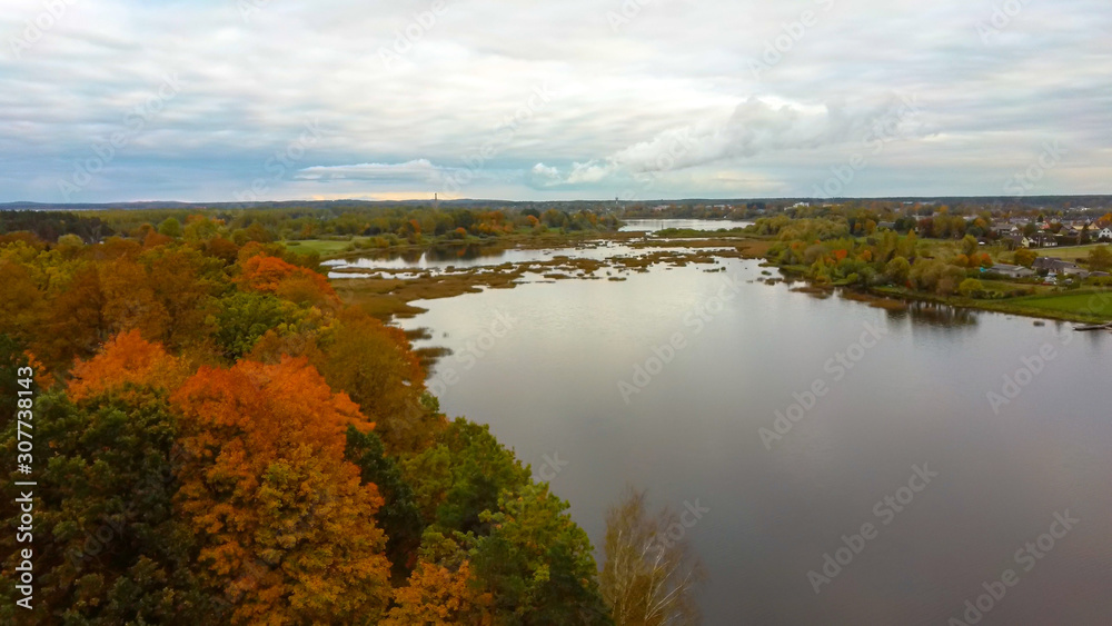 Doles Sala is  the Second Largest Island in Latvia. This is a Peninsula in the Daugava River, Near the Borders of Riga. Aerial Dron Shoot. Sunny Autumn Day.