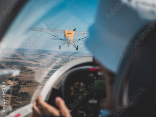 Airplane towing a glider, view from inside