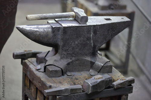 Heavy metal anvil in the forge for forging handmade products