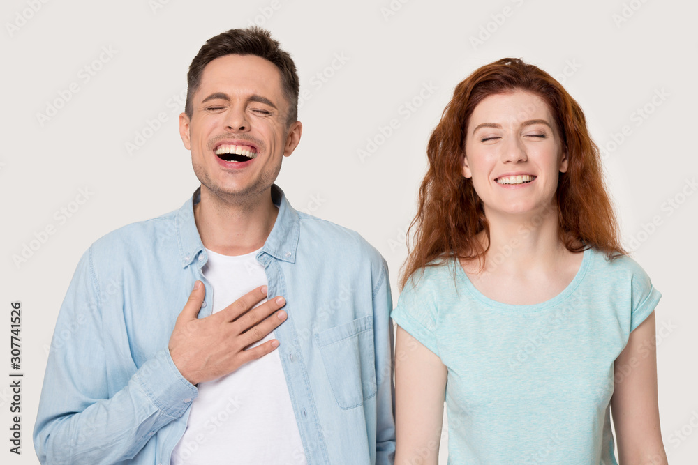 Sincere young family couple laughing portrait. Sincere young family couple laughing portrait.