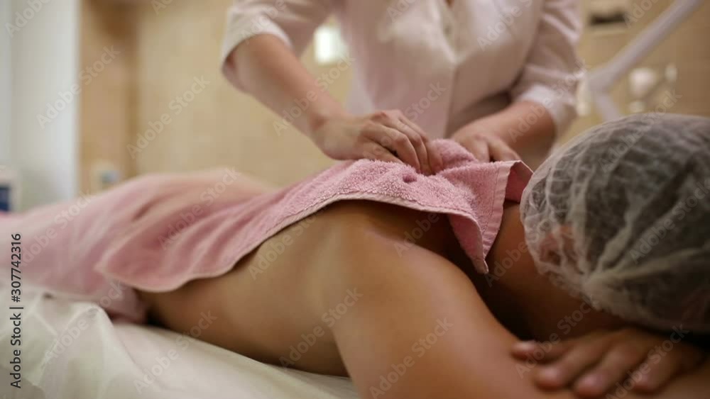 Massage therapy with a towel Massage therapy with a towel