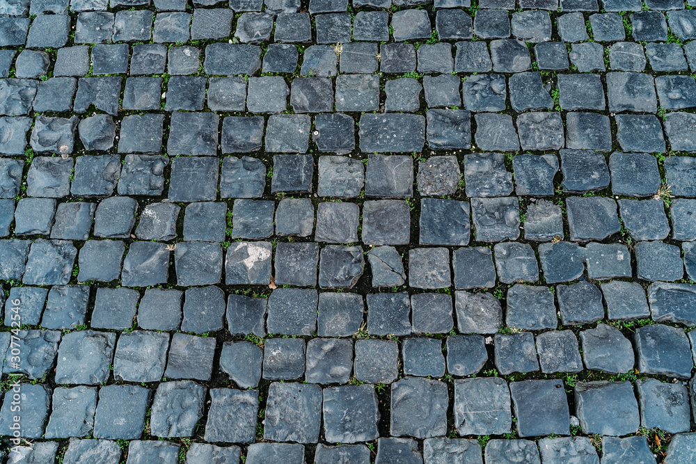 Paving stone texture, old Rome street top view as background for design.