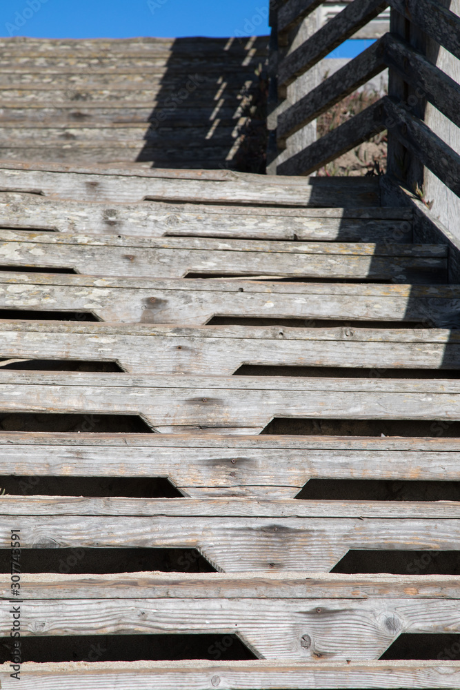 Close up on an old outdoor wooden staircase Close up on an old outdoor wooden staircase