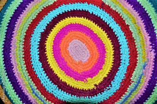 multicolored round handmade rug close up