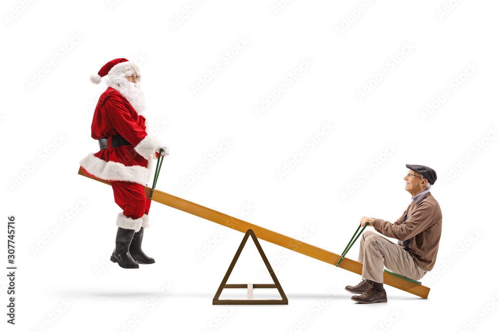 Santa Claus riding on a seesaw with an elderly man