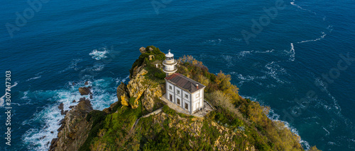 Getaria lighthouse in Gipuzkoa, Basque country - drone aerial view photo