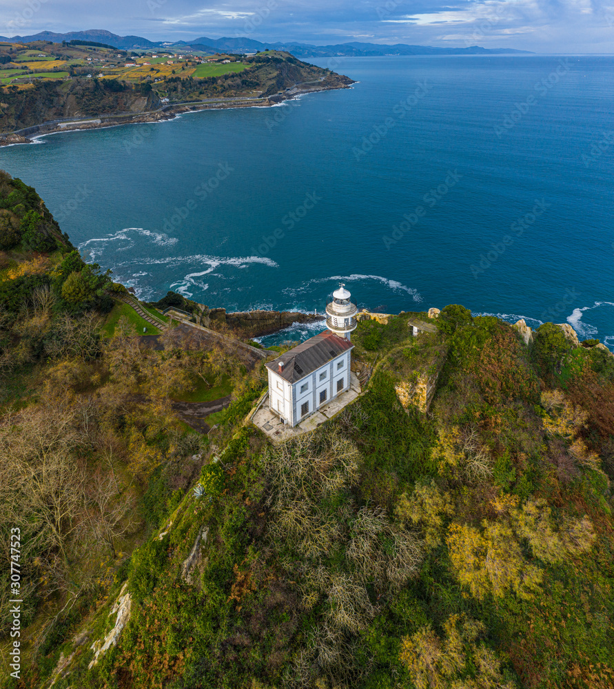 Getaria lighthouse in Gipuzkoa, Basque country - drone aerial view