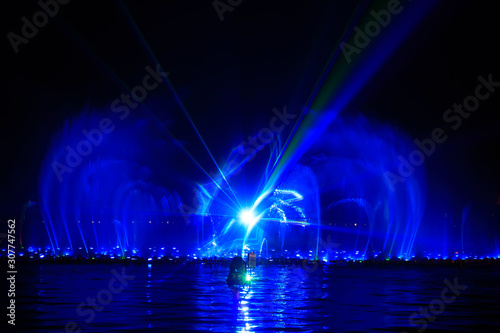 Fototapeta Naklejka Na Ścianę i Meble -  Music fountain water curtain laser