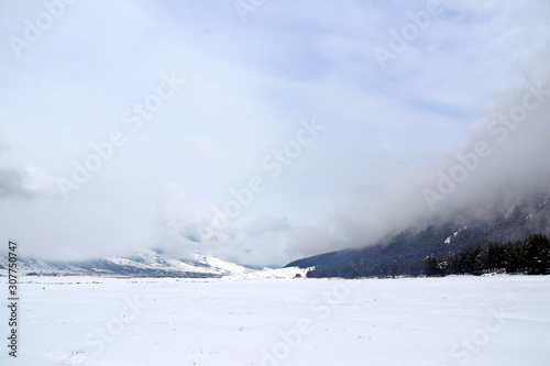 snowy valley between the mountains of the Caucasus