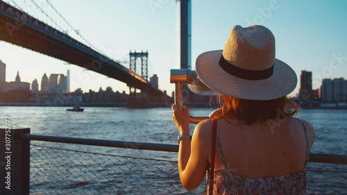Attractive woman at the view point in New York at sunset
