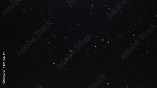 particles on black background, abstract overlay with particles and bokeh