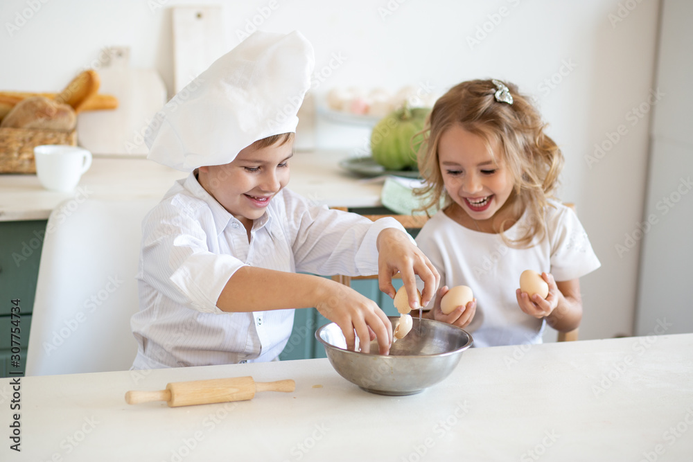 Kid chefs in the kitchen at home Kid chefs in the kitchen at home