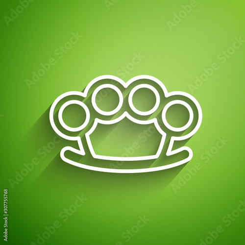 White line Brass knuckles icon isolated on green background. Vector Illustration