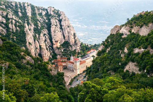 Panoramic view of  Benedictine abbey, Santa Maria de Montserrat, in Montserrat mountains, near Barcelona, Catalonia, Spain photo