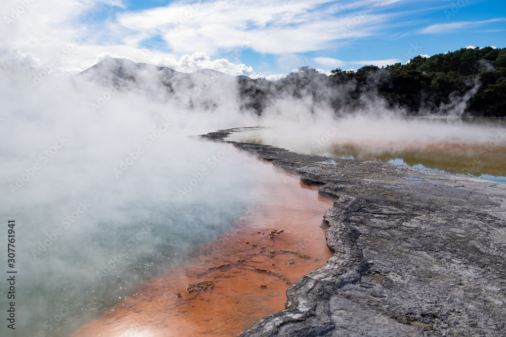 Colorful geothermal pool steaming