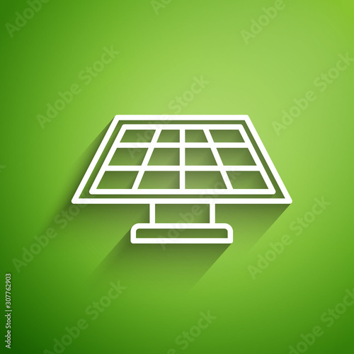 White line Solar energy panel icon isolated on green background. Vector Illustration