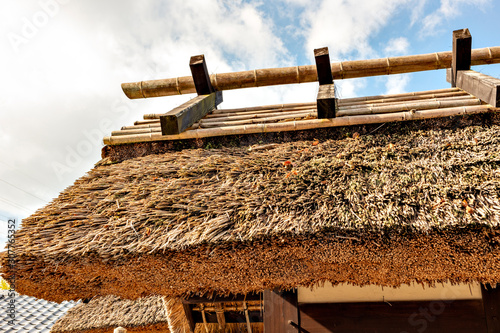 Old traditional Japanese house with thatched roof in Tanba-sasayama city, Hyogo prefecture, Japan photo