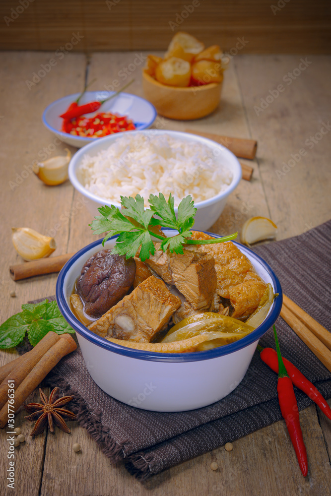 malaysian bak kut teh stew of pork with chinese herb soup and rice.