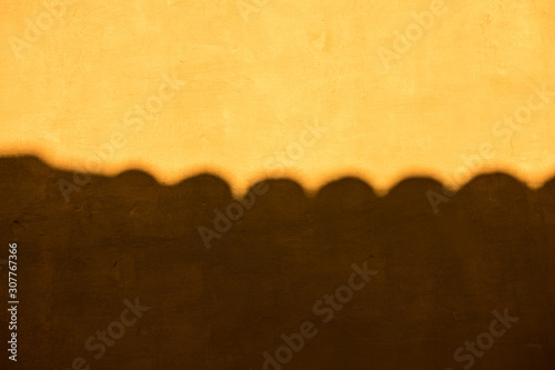 yellow painted wall and shadow