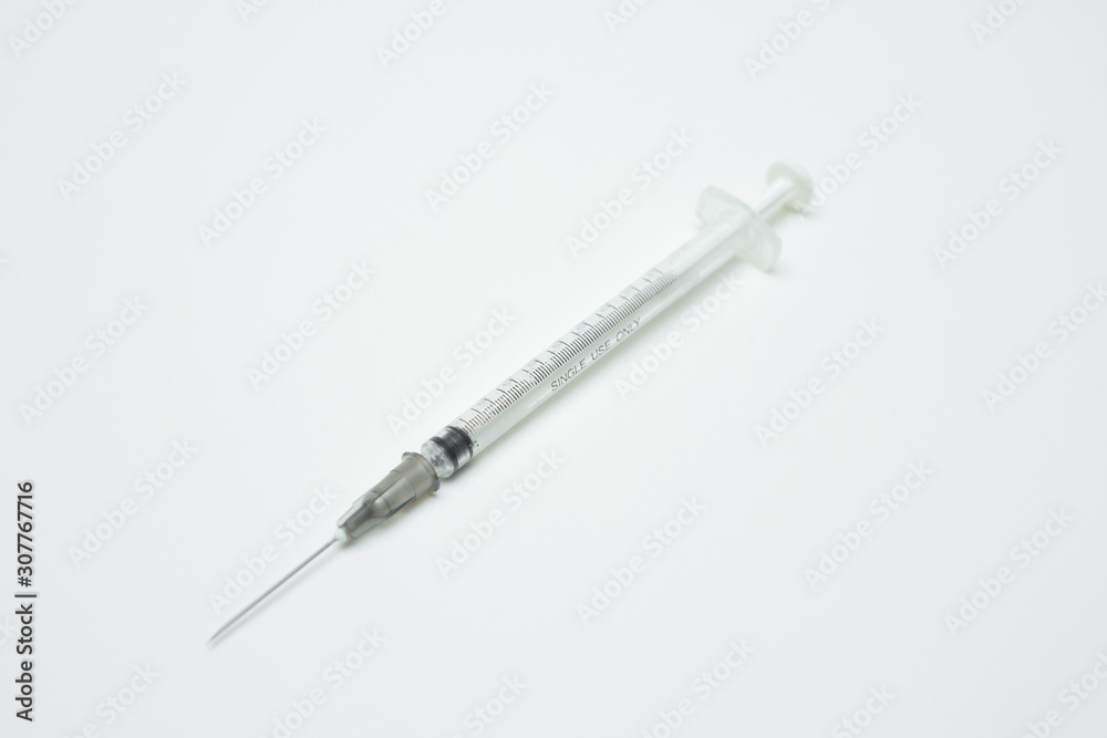 Syringe on a white background Syringe on a white background