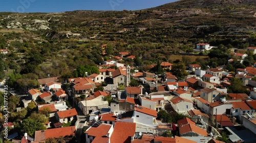 Interesting sights include the old wine press, the Commandaria Storage Museum, and an old olive press. There are a number of art galleries taverns and shops. photo