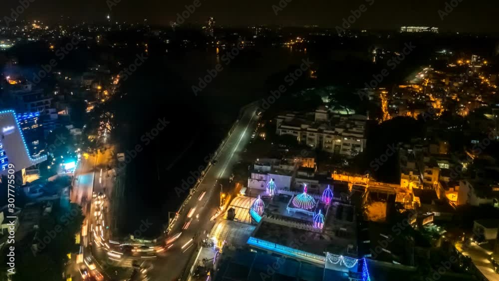 View of Busy Night Life in Bangalore Downtown Area with Traffic and Temple Colors View of Busy Night Life in Bangalore Downtown Area with Traffic and Temple Colors