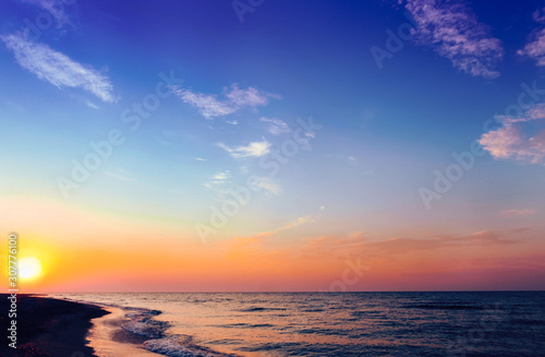 Fototapeta Naklejka Na Ścianę i Meble -  Beautiful sky at sunrise on the beach