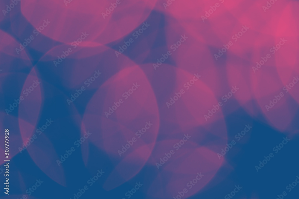 Classic blue background with pink bokeh lights. Holiday, Christmas and New Year background. Horizontal