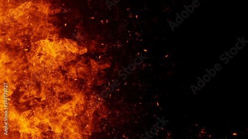 Texture of burn fire with particles embers. Flames on isolated black background. Texture for banner,flyer,card .