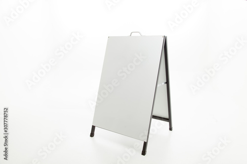 Side walk or blank folding signs on white background  photo